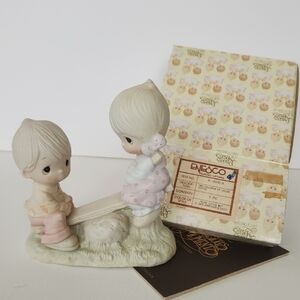 Enesco Precious Moments Figurine-"Love Lifted Me"